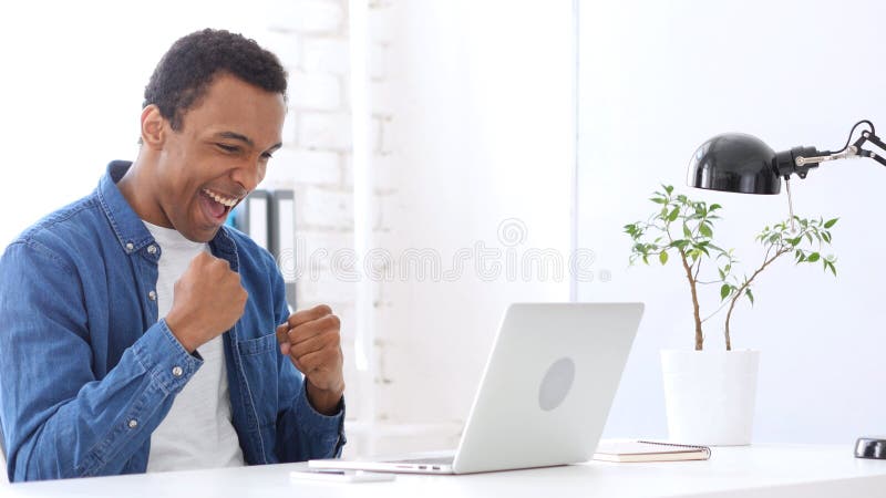 Afro-American Man Celebrating Success and Achievement