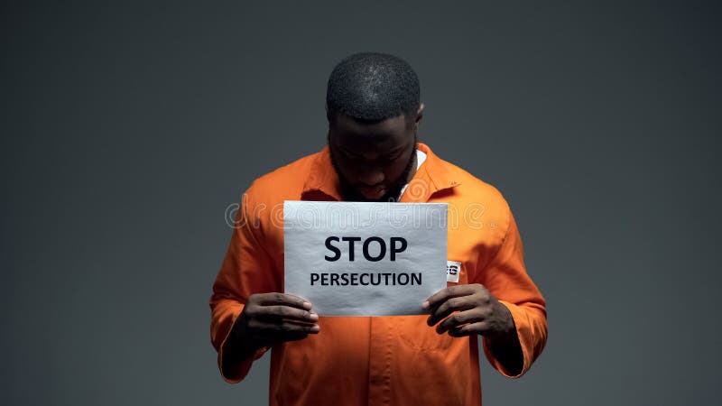 afro-american-prisoner-holding-stop-persecution-sign-racial-discrimination-stock-photo-156630894.jpg