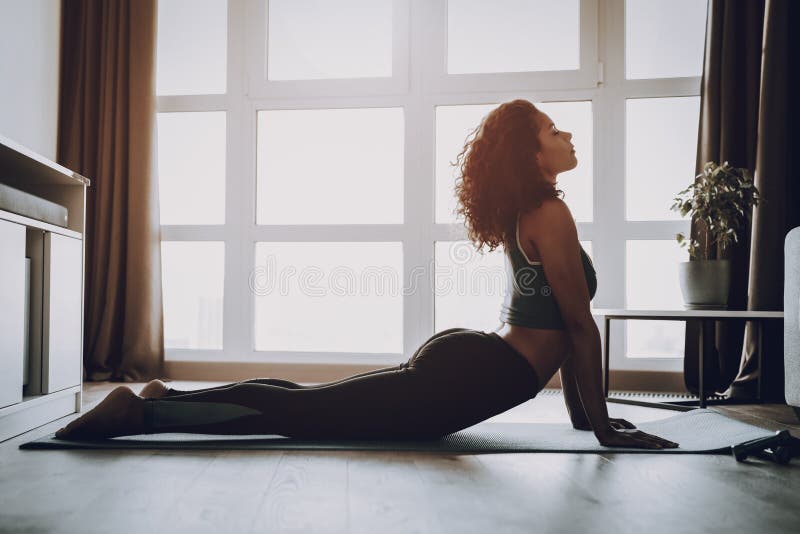 Afro American Young Girl. Home Fitness Concept. stock image Afro American Young Girl. Home Fitness Concept. stock image