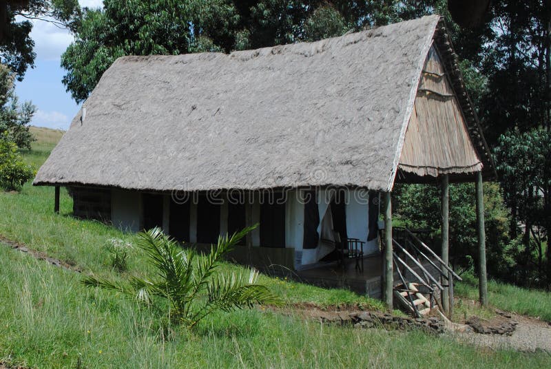 AFRICA, KENYA, AUGUST 3,  2010: Bungalow in the mountains of Africa, lovely holidays in the sun chilling in the resort. AFRICA, KENYA, AUGUST 3,  2010: Bungalow in the mountains of Africa, lovely holidays in the sun chilling in the resort