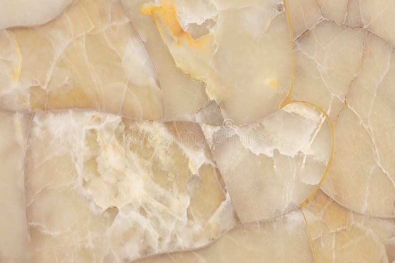Agate gemstone shining translucent texture, gem quartz honey light yellow background, semi-precious marble translucent texture
