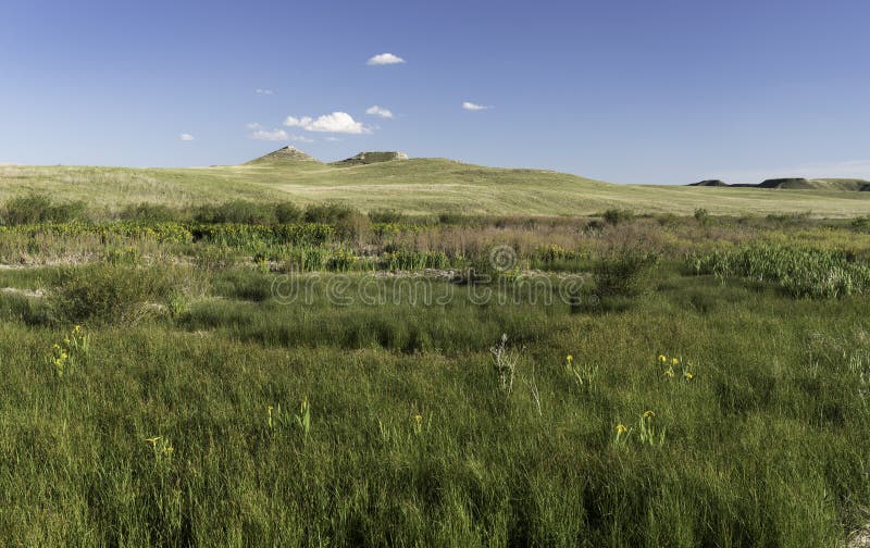 Agate Fossil Beds National Monument is located on the North Western Panhandle of Nebraska. The Niobrara River flows through the National Monument creating generous wetlands. Agate Fossil Beds National Monument is located on the North Western Panhandle of Nebraska. The Niobrara River flows through the National Monument creating generous wetlands.