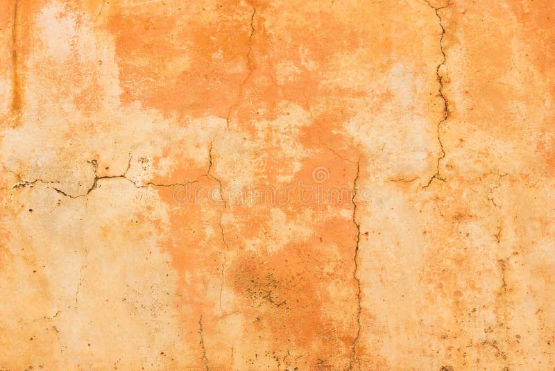 Antique old cracked brown plaster wall background texture