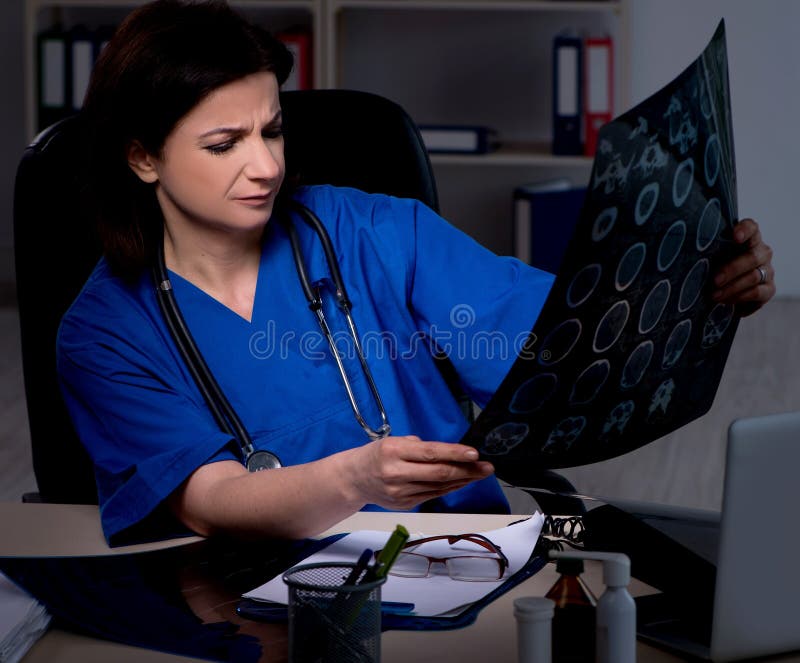 Aged Female Doctor Working at Night Shift Stock Photo Image of