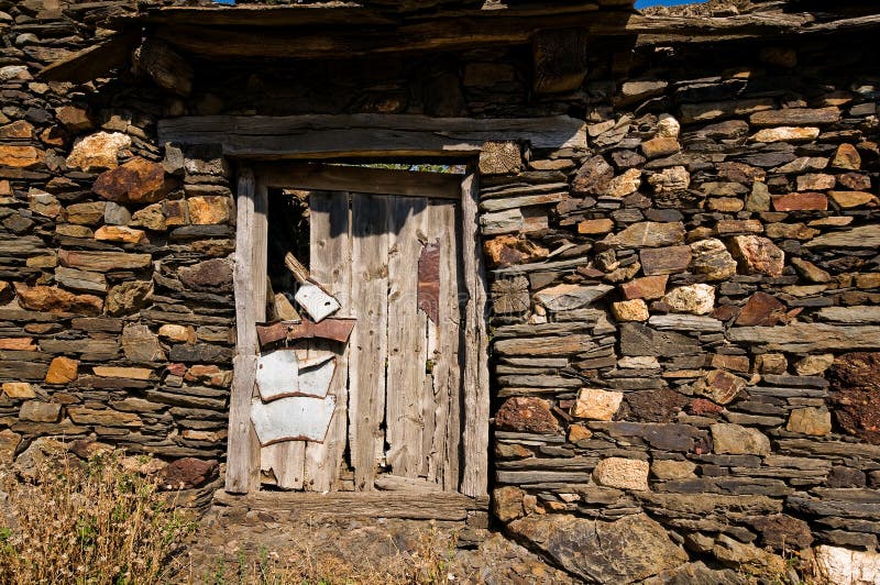 Aged wooden door in an ancient house