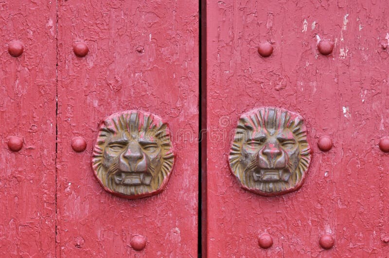 Aged wooden door in red