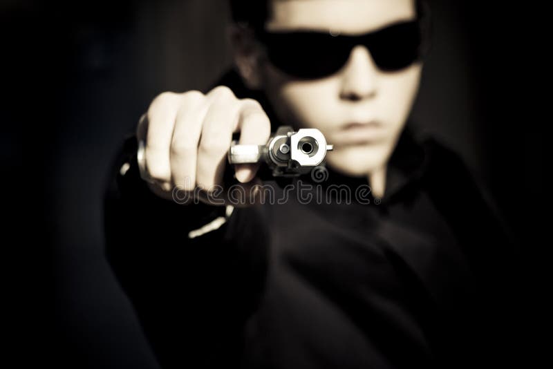 Agent with gun