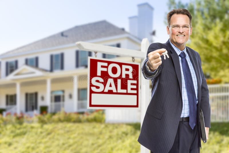 Agent with Keys in Front of Sale Sign and House