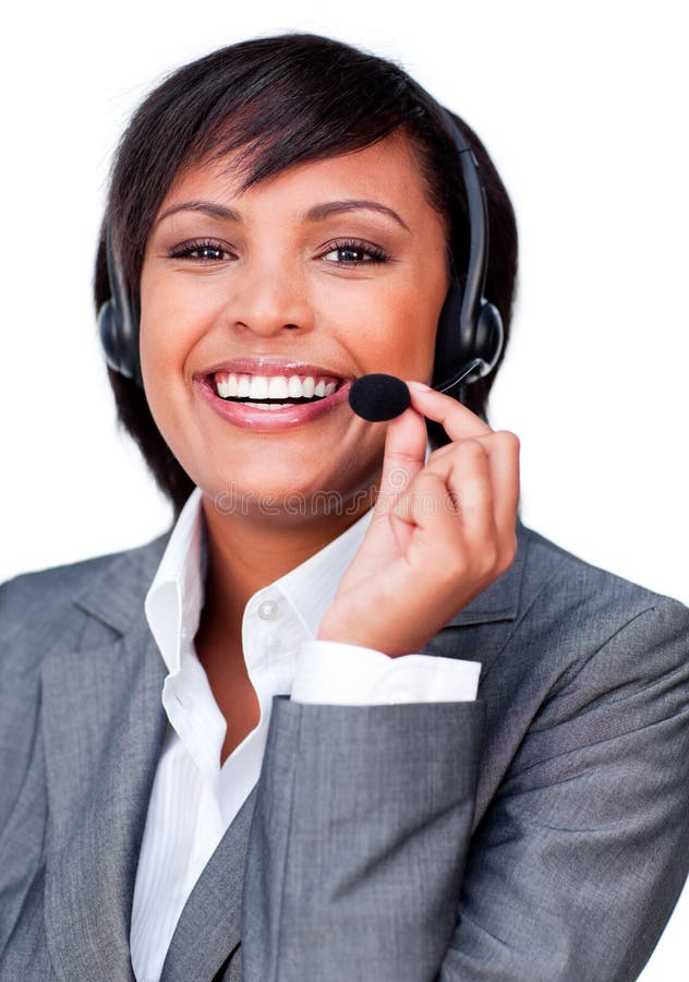 Agente novo do serviço de atenção a o cliente com auriculares sobre foto de stock Agente novo do serviço de atenção a o cliente com auriculares sobre foto de stock