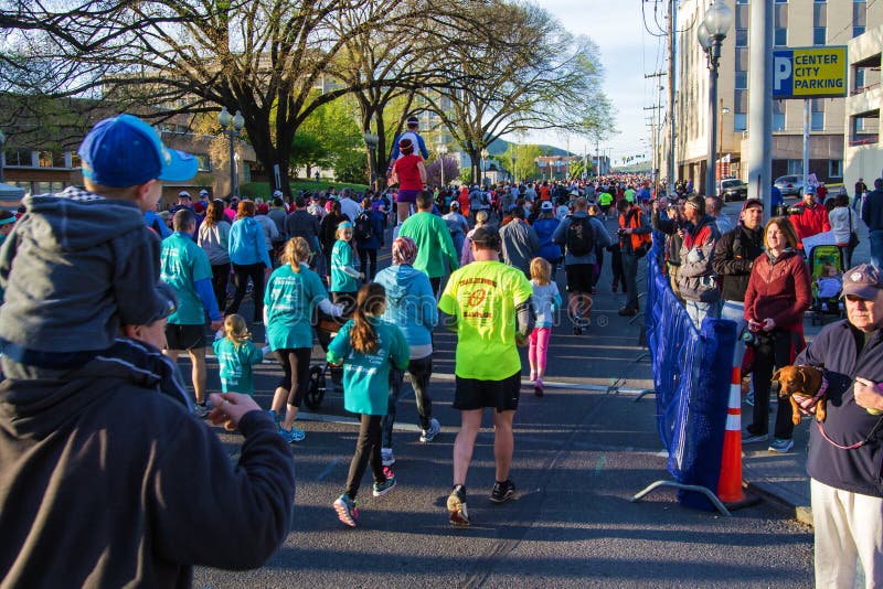 Roanoke, VA – April 16th: Runners beginning the Blue Ridge Marathon, known as “America’s Toughest 10k Road Marathon”, located in Roanoke, Virginia, USA on April 16th, 2016. Roanoke, VA – April 16th: Runners beginning the Blue Ridge Marathon, known as “America’s Toughest 10k Road Marathon”, located in Roanoke, Virginia, USA on April 16th, 2016.