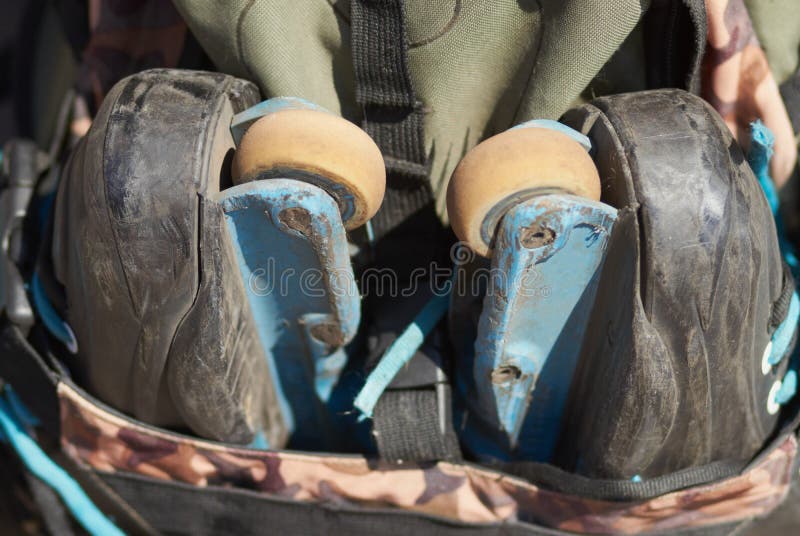 Aggressive in-line rollerblades in a backpack