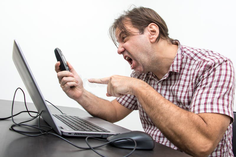 Aggressive man screaming at phone stock photography Aggressive man screaming at phone stock photography