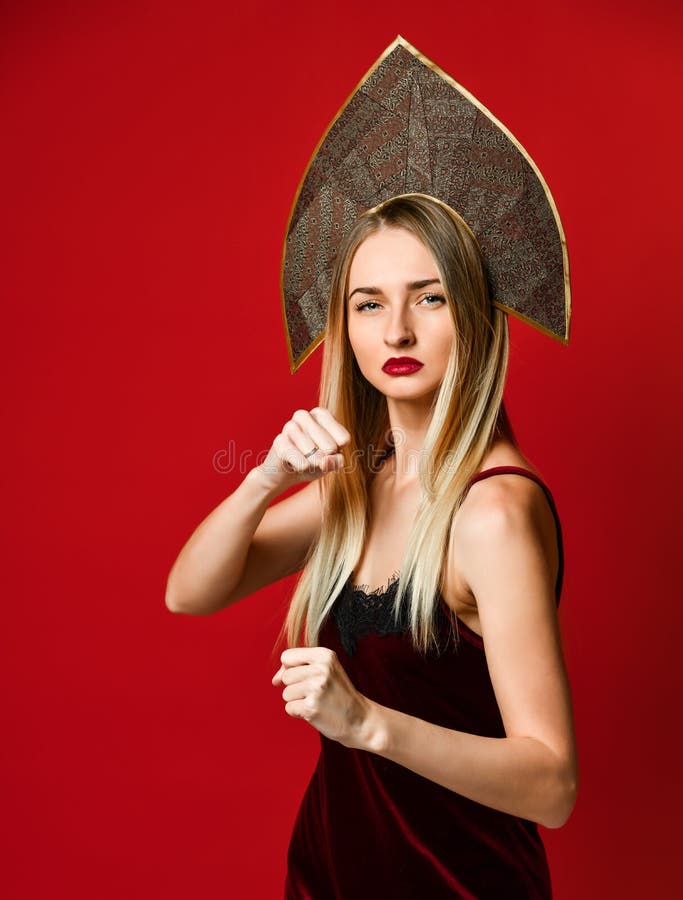 Aggressive woman boxing. Expression emotion and feelings concept. Studio shot stock photography Aggressive woman boxing. Expression emotion and feelings concept. Studio shot stock photography