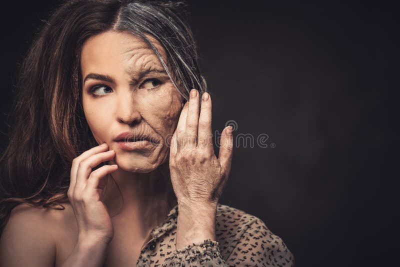 Aging, skin care concept. Half old half young woman.