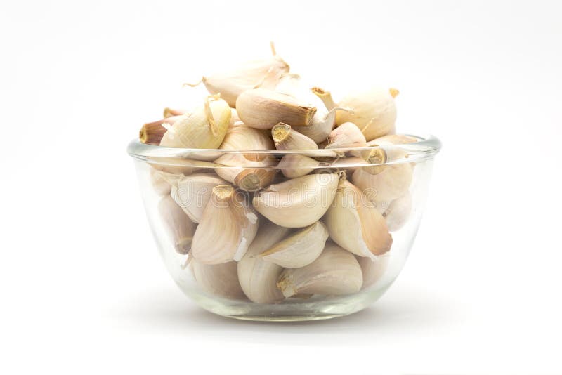 Aglio secco fresco sulla tazza immagini stock Aglio secco fresco sulla tazza immagini stock