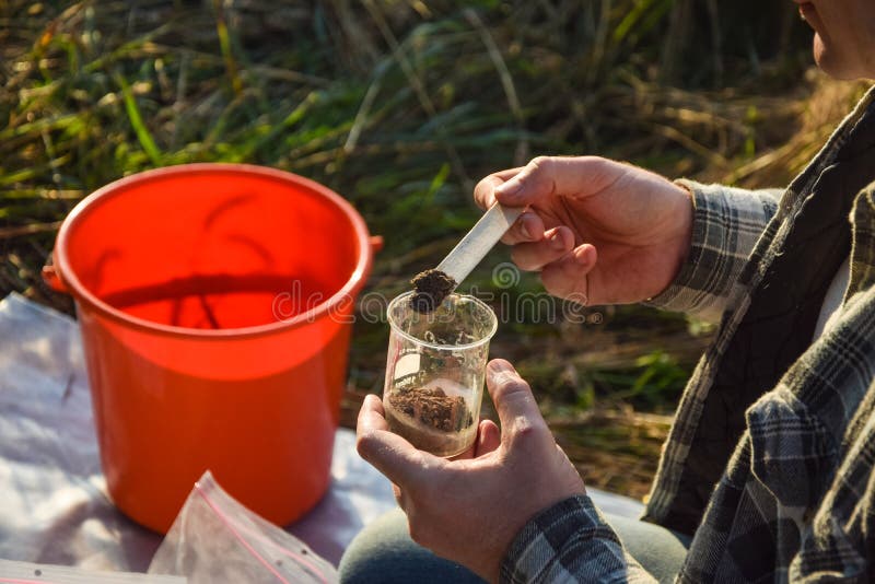Agronomy Specialist Testing Soil Sample Labortory Equipment Outdoors