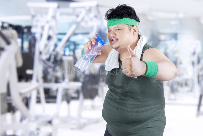 Agua Potable 2 Del Hombre Gordo Imagen de archivo Imagen de agotado