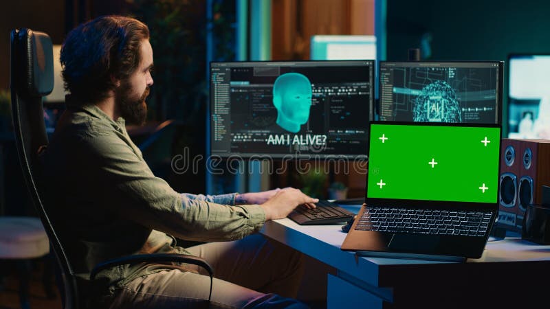 AI becoming sentient, chatting with computer scientist, green screen laptop stock photography