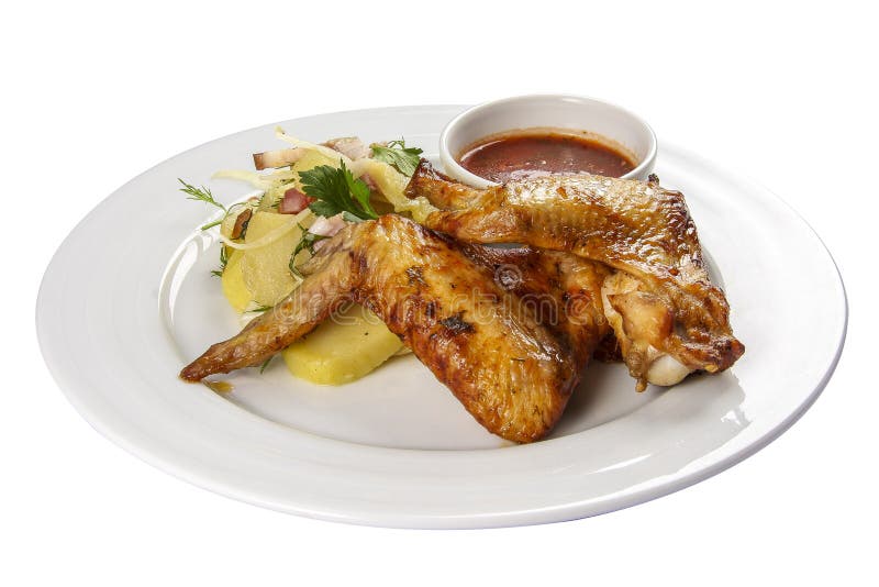 Ailes de poulet frit avec des pommes de terre image stock Ailes de poulet frit avec des pommes de terre image stock