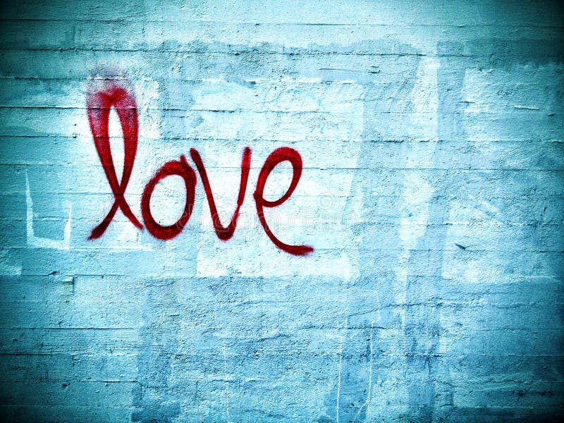 Love written on a concrete wall in red spray paint. Love written on a concrete wall in red spray paint.