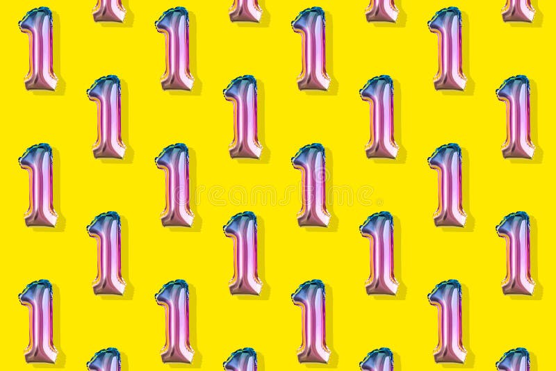 Air Balloons of Number One Shaped Foil on Pastel Yellow Background