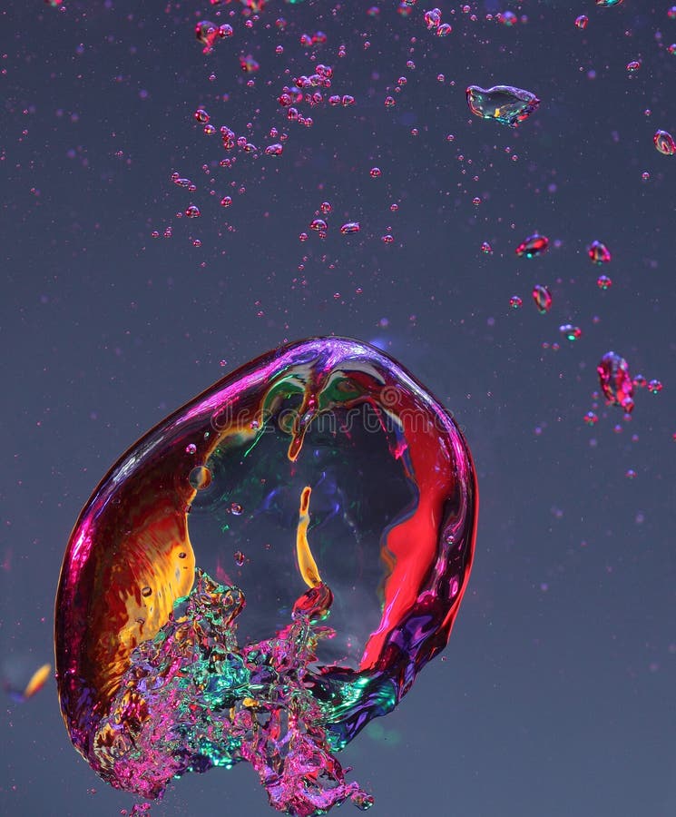 A background of strange shaped colorful air bubbles in water.