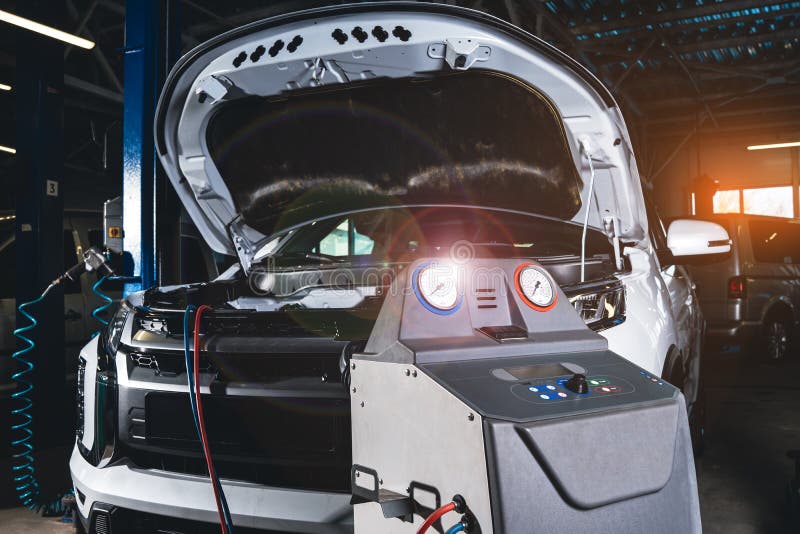 Air Conditioner or Climate Control Servicing. Diagnostics and Refueling