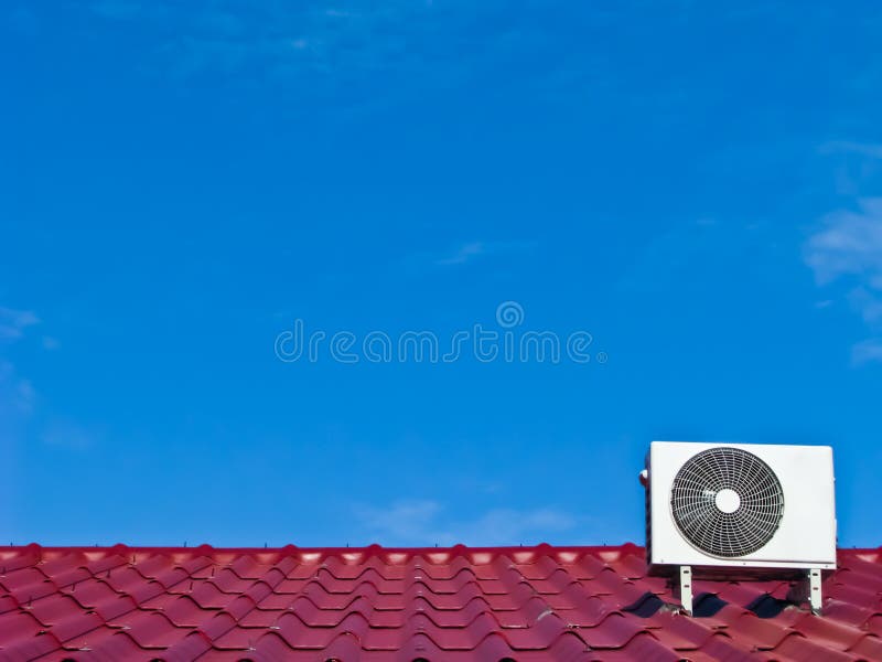 Air conditioner compressor on the red roof