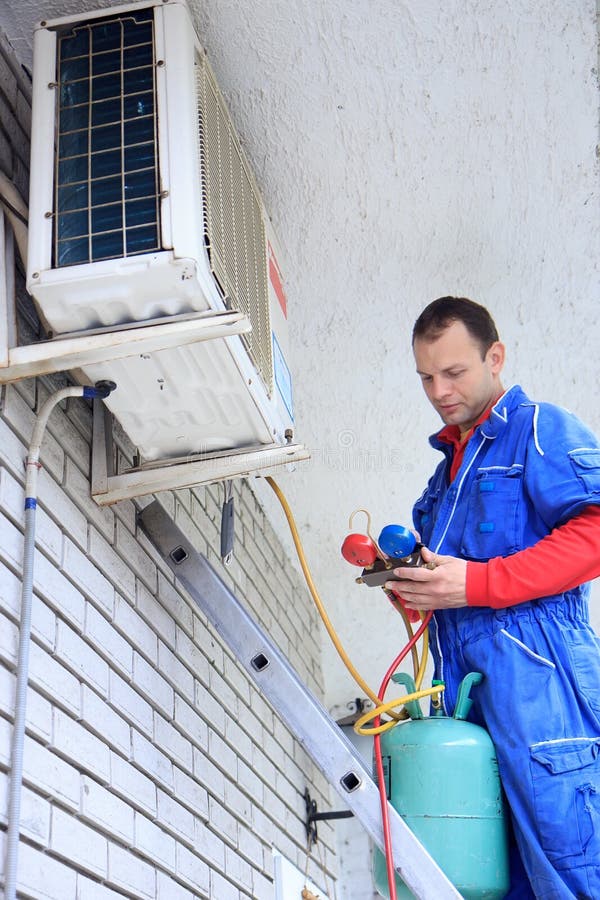 Installer Sets a New Air Conditioner Stock Image Image of installer