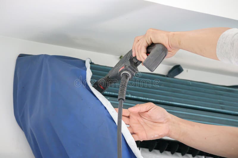 Air Conditioning Cleaning Service with Water Spray Stock Photo Image