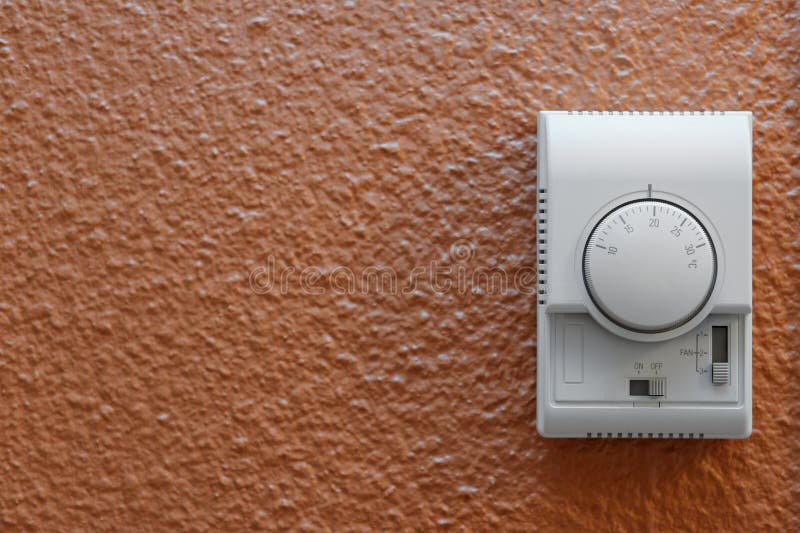 Air conditioning control panel on wall stock photo