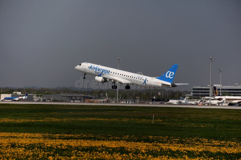 Air Europa Express Embraer jet taking off from Munich Airport, MUC stock photography Air Europa Express Embraer jet taking off from Munich Airport, MUC stock photography