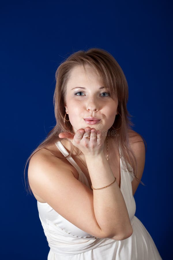 Air-kissing long-haired girl stock images