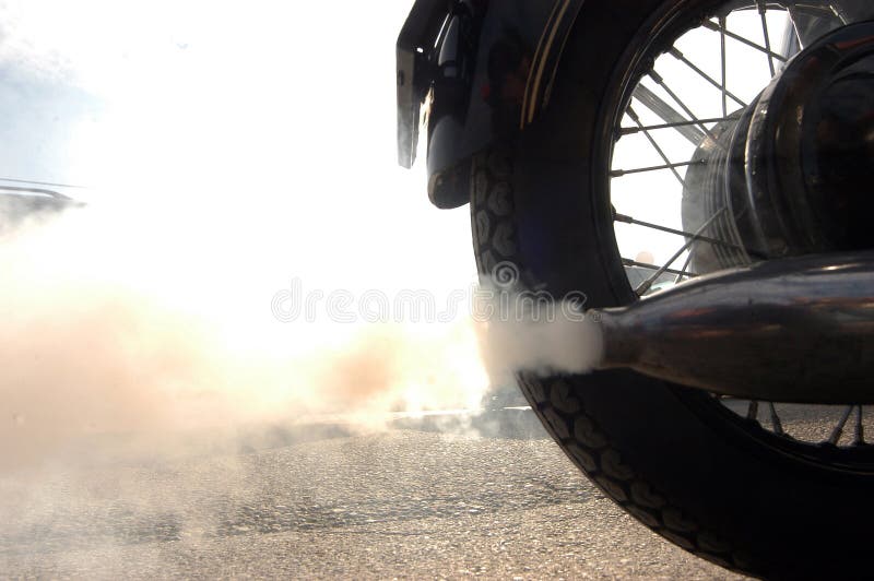 Motorcycle exhaust smoke stock photo. Image of exhaust 135555404
