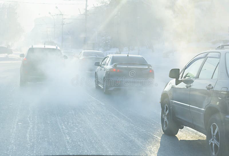 Air Pollution from Exhaust Fumes from Cars in the City, on a Cold Day ...