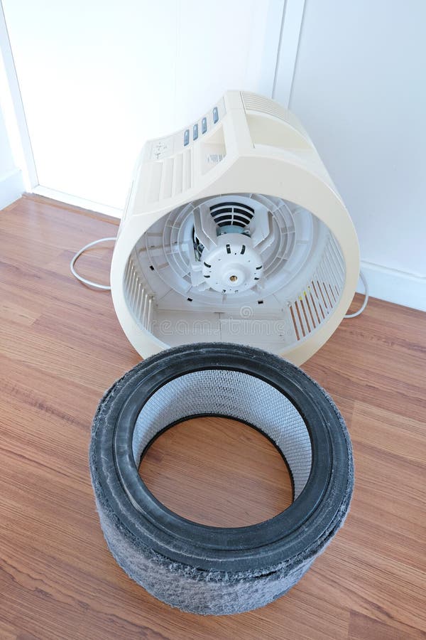 PM 2.5 Air Pollution. Air Purifier Maintenance. the Dirty Filter of Air