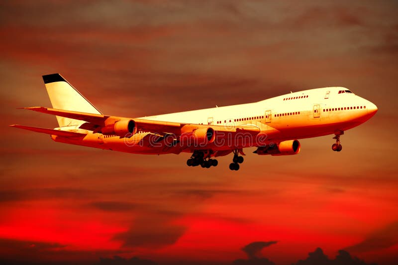 Air travel - plane and sunset