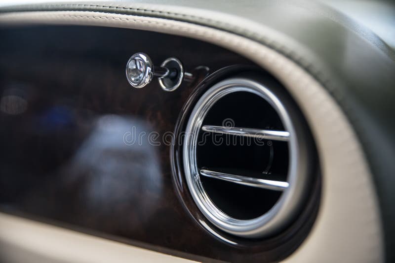 Luxury Car Air Vents and Air Conditioning. Modern Car Stock Photo