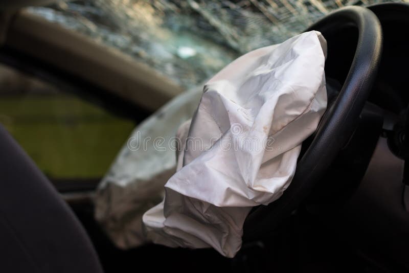 Airbag accident with broken glass.