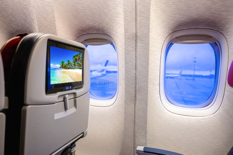 Aircraft cabin chair with TV