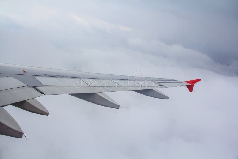 Aircraft wing in the air stock photo. Image of earth 37637518