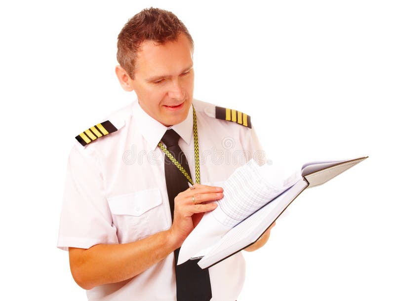 Airline pilot filling in papers stock photos