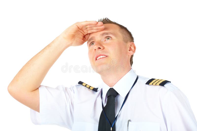 Airline pilot looking upwards royalty free stock image