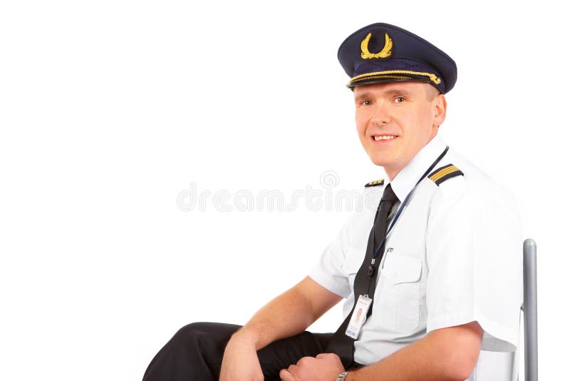 Airline pilot sitting stock image