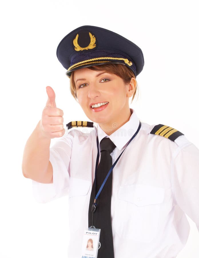 Airline pilot thumb up royalty free stock photo