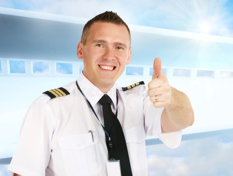Airline pilot thumb up royalty free stock images