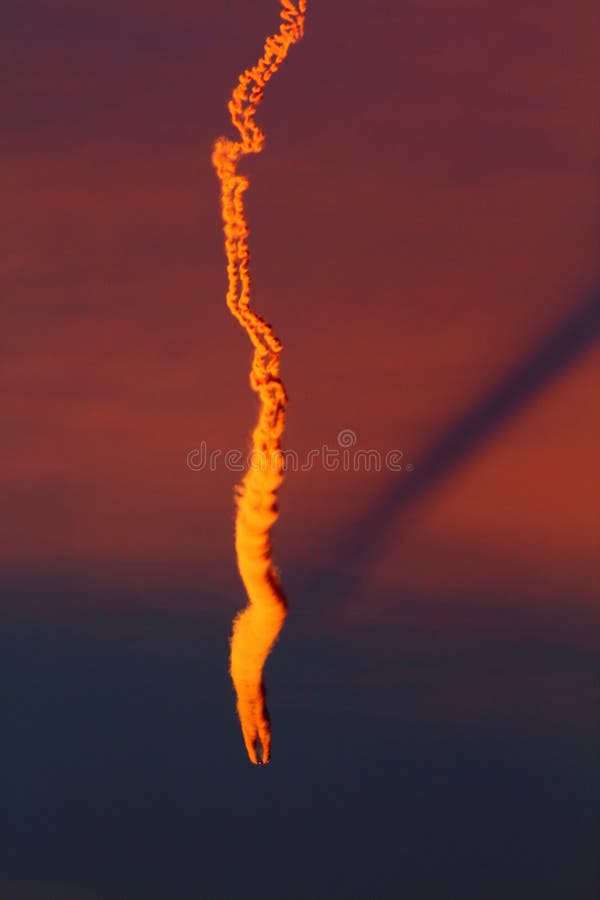 Airliner with contrail on a high altitude