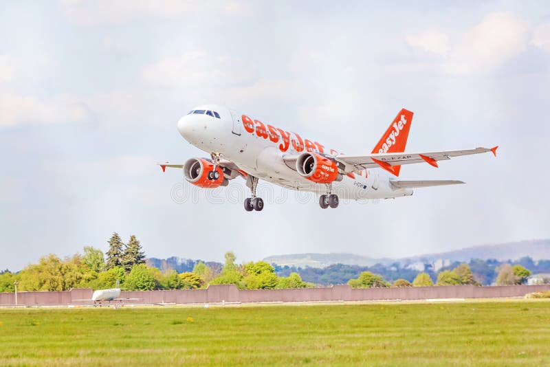 Airplane of EasyJet before Landing / after Takeoff, Sky with Clouds Editorial Photo - Image of 