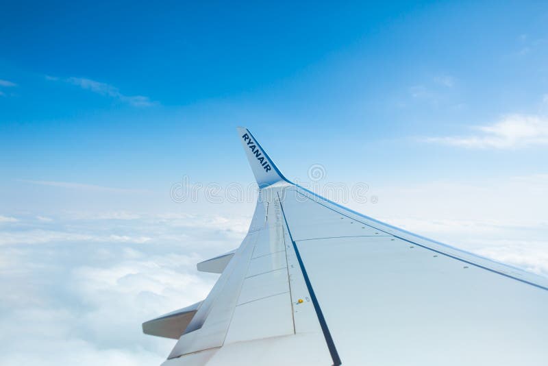 Airplane Flight at Altitude. Airplane Above the Clouds Editorial Stock