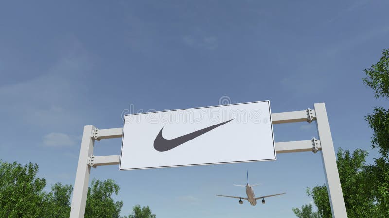 Airplane Flying Over Advertising Billboard with Nike Inscription and Logo.  Editorial 3D Rendering Editorial Image - Image of american, motorway:  90105860